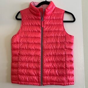 Kids girl polyester vest. Only once wore. Color is very pretty orange pink.